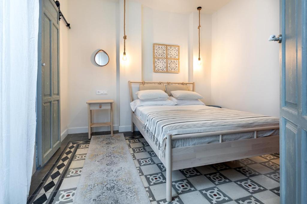 Apartamentos PROGRESO客房内的一张或多张床位