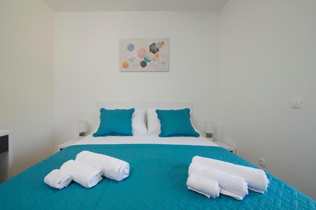 Apartments Antica Trogir客房内的一张或多张床位