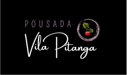 桑托斯Pousada Vila Pitanga的红番茄红素的标语