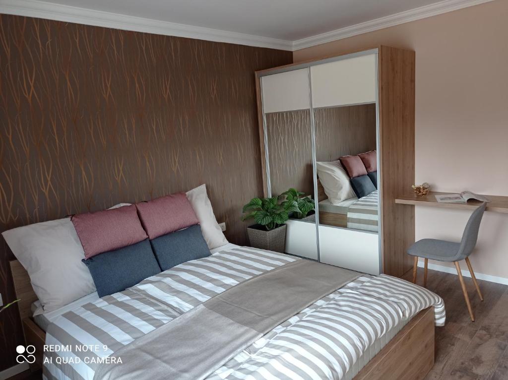 Karos Bianco Apartmanház客房内的一张或多张床位