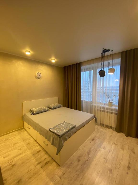 Apartment on bulvar Tsvetochnyy客房内的一张或多张床位