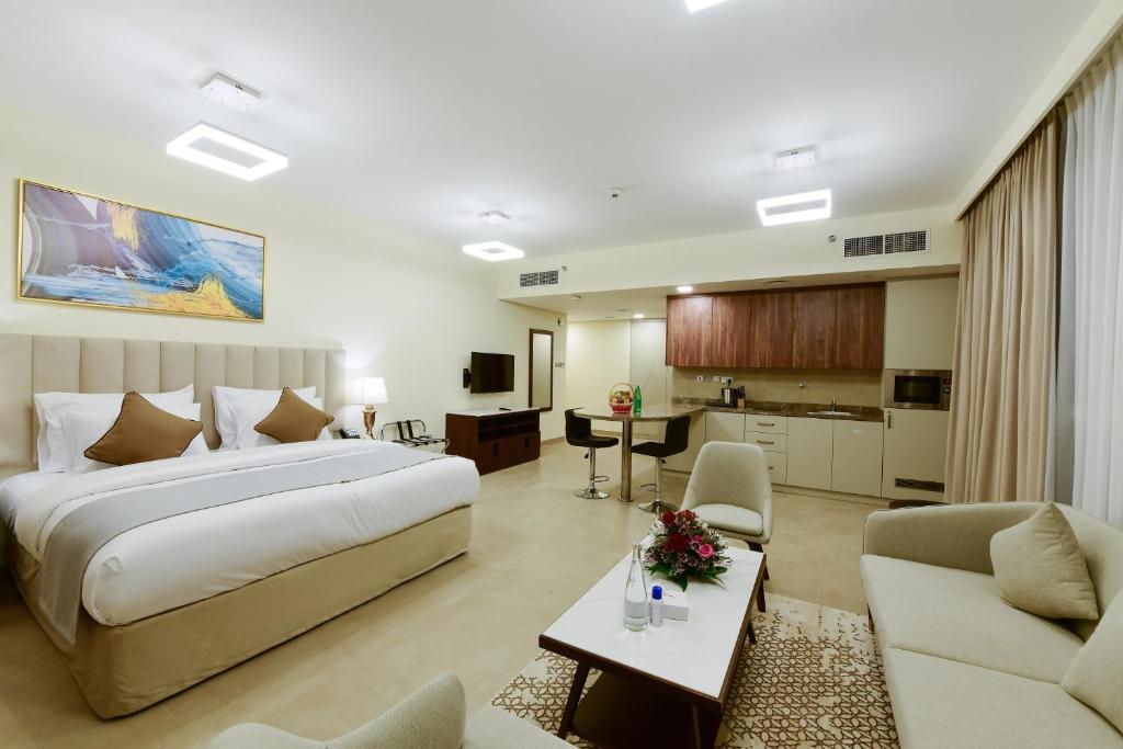 Saray Deluxe Hotel Apartments客房内的一张或多张床位