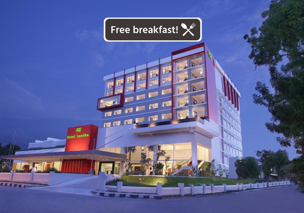 帕卢萨提卡帕卢酒店的一家有阅读免费早餐标志的酒店