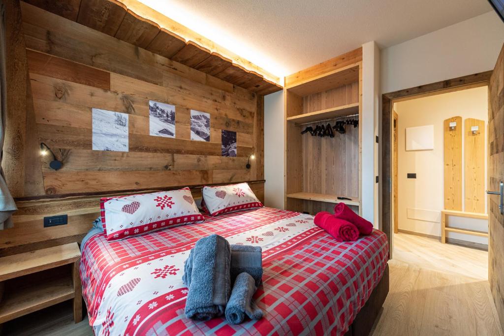 AG Apartments Livigno centro客房内的一张或多张床位