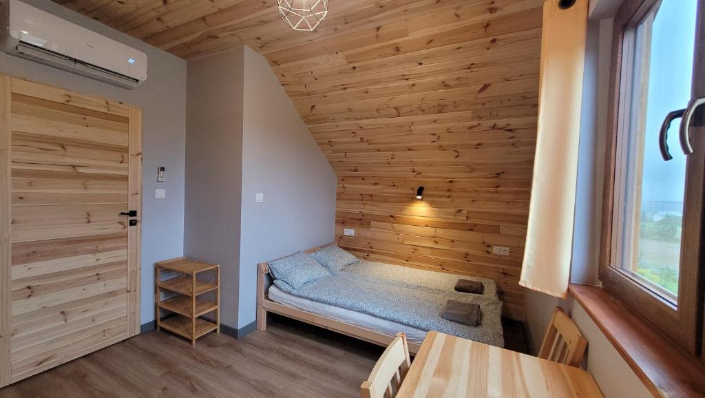 Wrzosowe Wzgórze客房内的一张或多张床位