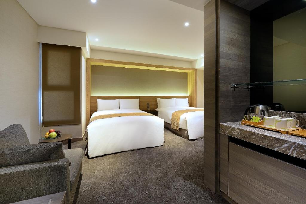 花莲市成旅晶赞饭店-花莲假期的酒店客房带两张床和厨房