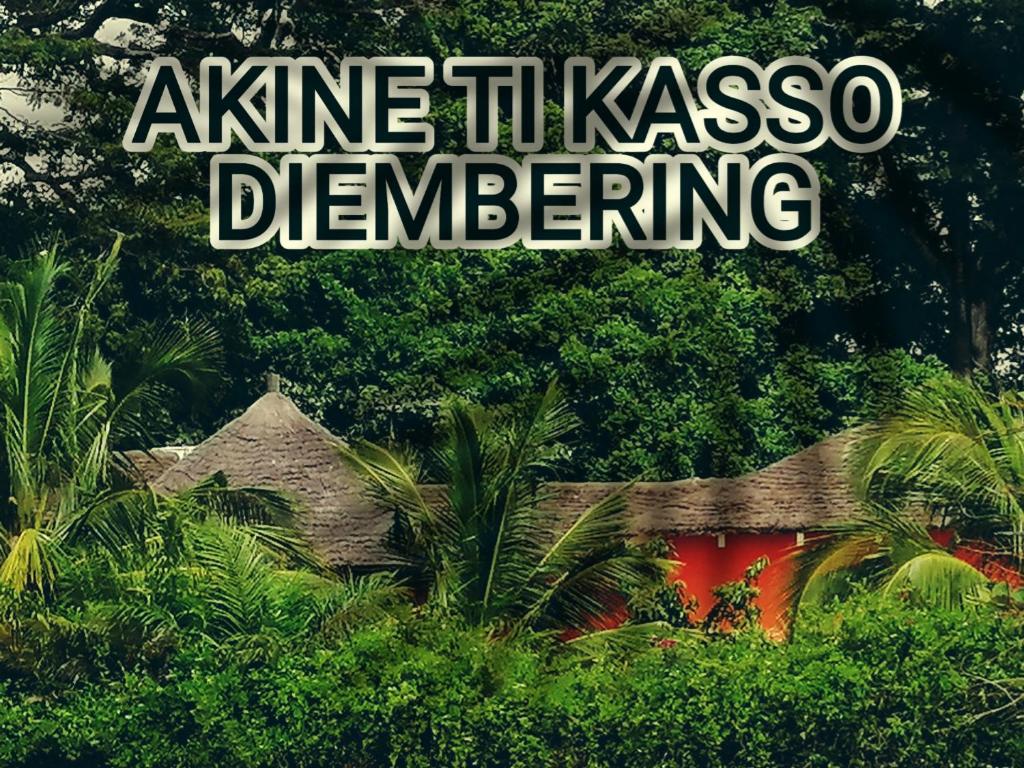 DiembérengAKINE TI KASSO piscine的一种读到近乎古怪的 ⁇ 色的符号