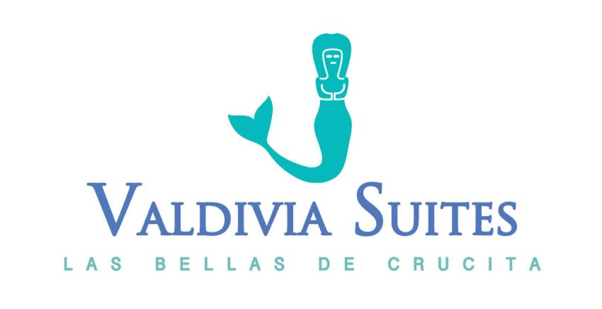 克鲁奇塔Valdivia Suites的兽医诊所的标志,带牙刷