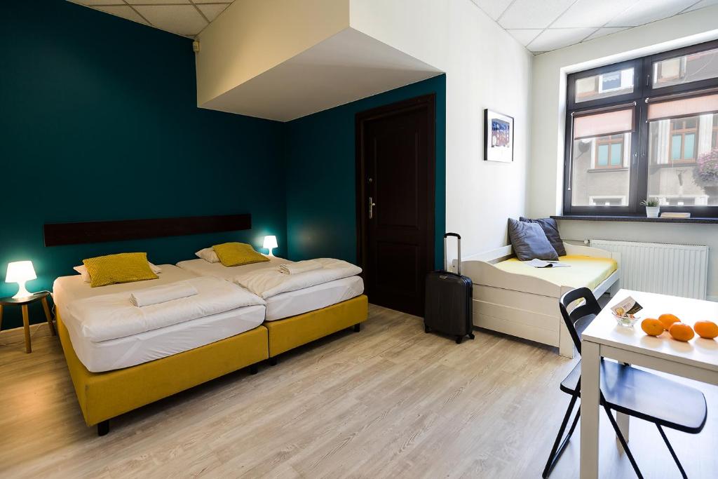 Hello Hostel & Apartments客房内的一张或多张床位