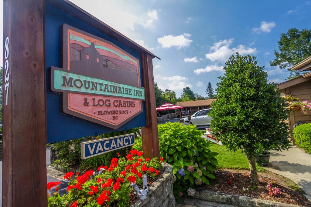 布洛英罗克山Mountainaire Inn and Log Cabins的山间旅馆和冰城堡的标志