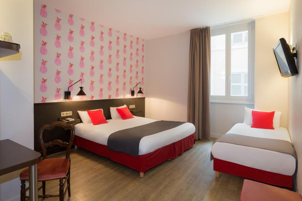 Hôtel Marsiho by HappyCulture - ex Best Western Marseille客房内的一张或多张床位