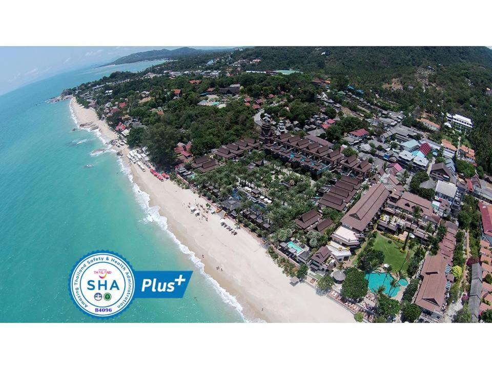 拉迈Ammatara Pura Pool Villa的享有海滩空中美景和度假胜地