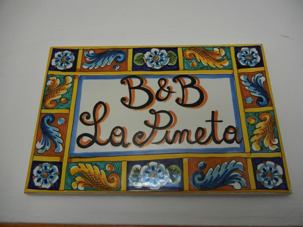 雷焦卡拉布里亚B&B La Pineta的baja Jamaica餐厅的标志