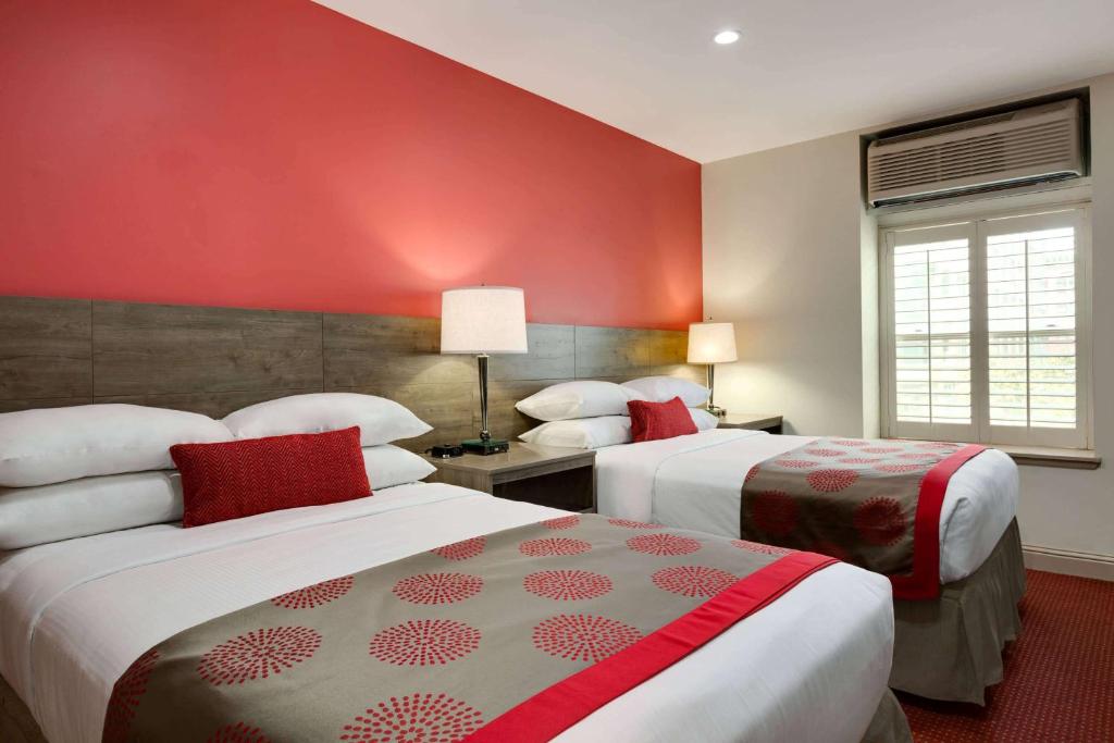 克拉丽奥酒店奥克兰市中心客房内的一张或多张床位