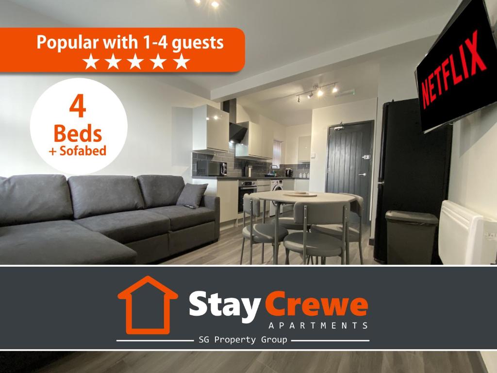 克鲁StayCrewe Apartments的客厅配有沙发和桌子