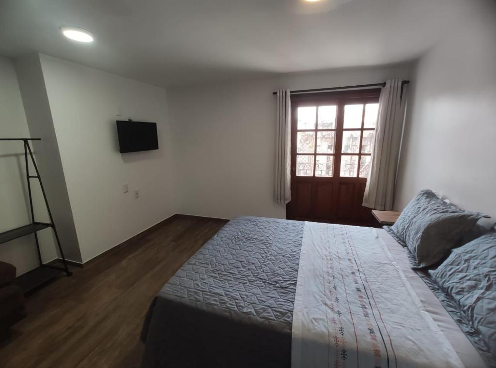 Bahia Pelô Hostel客房内的一张或多张床位