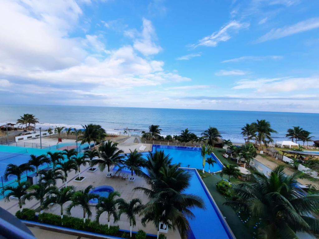 通苏帕Departamento frente al mar, FONTAINE BLEAU的享有度假胜地的空中景致,以海洋为背景