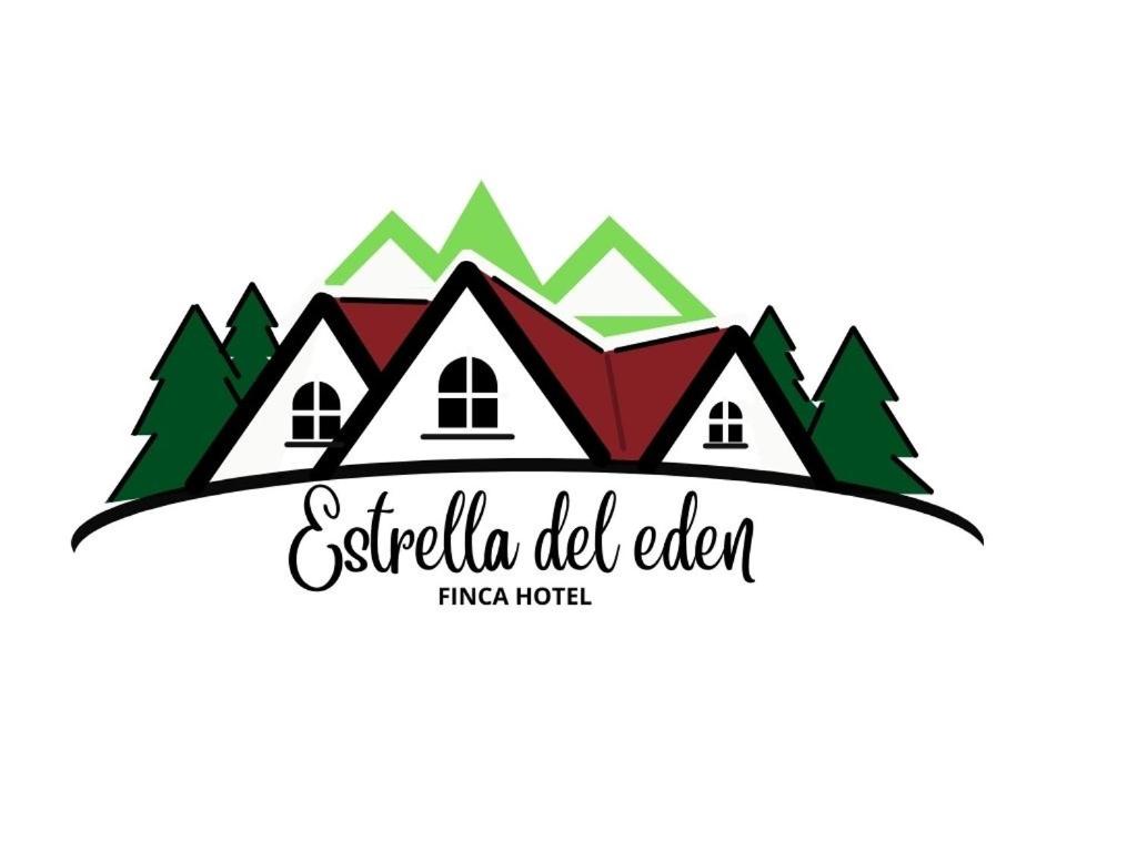 亚美尼亚Finca Hotel Estrella del Eden的房屋和树木的房地产经纪人的标志