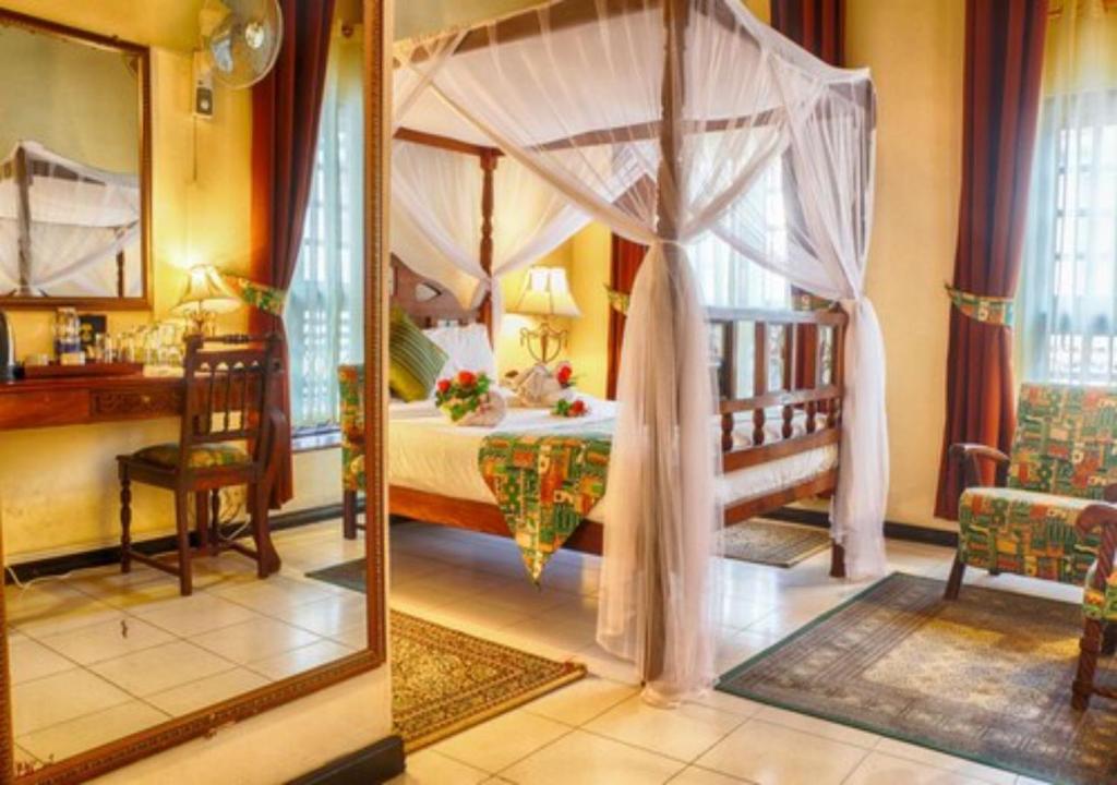 Africa House Zanzibar客房内的一张或多张床位