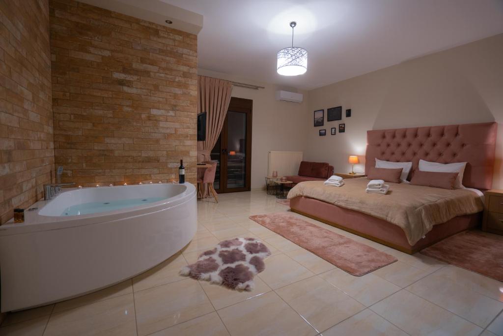 卡托劳塔翁Zillis Apartments的一间卧室配有一张床和浴缸