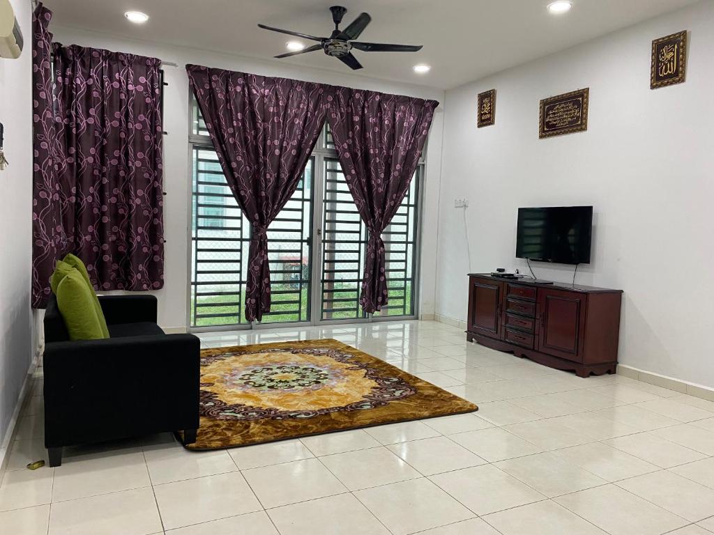 JARUM PENITI HOMESTAY PCB KOTA BHARU的休息区