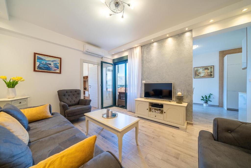 Boka View Luxury Suite - With free Garage Parking的电视和&#47;或娱乐中心