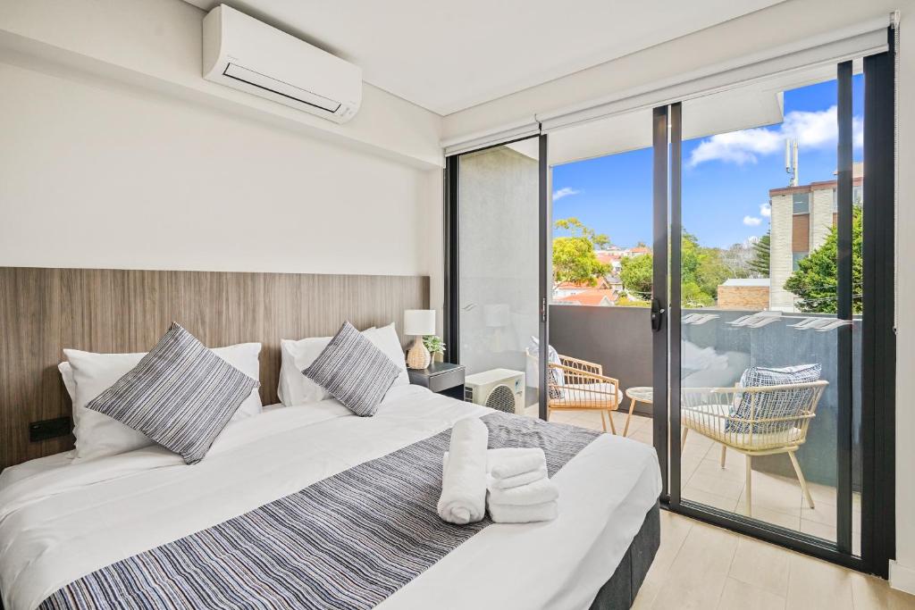 Coogee Studio Apartments客房内的一张或多张床位