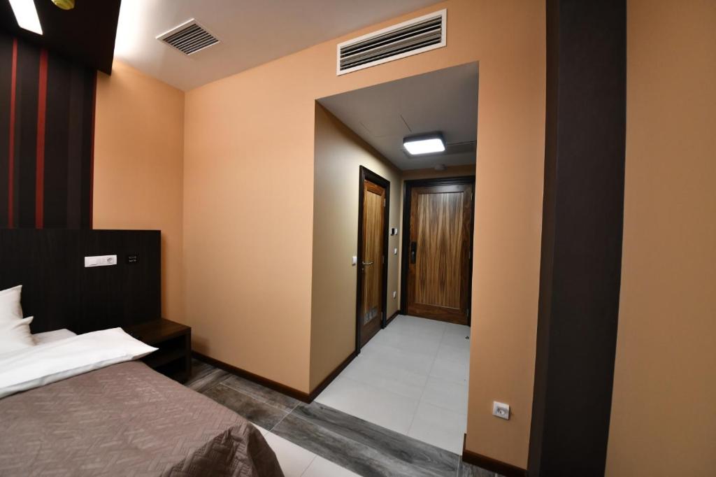 Hotel Havana Loznica客房内的一张或多张床位