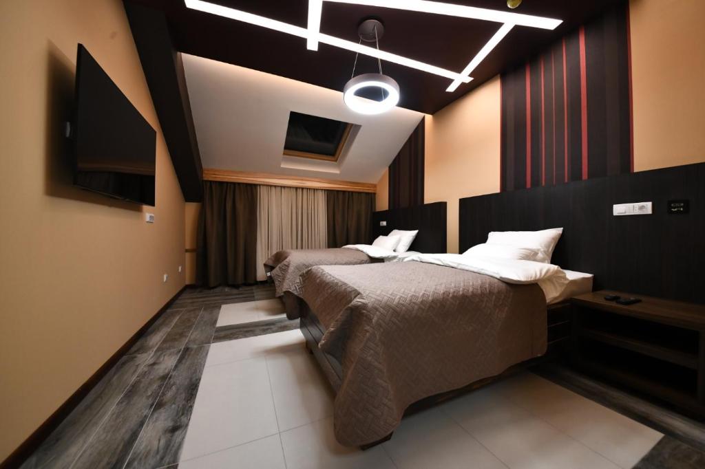 Hotel Havana Loznica客房内的一张或多张床位