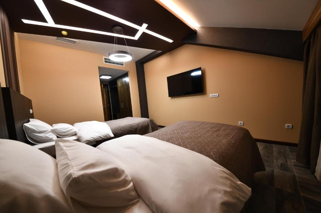 Hotel Havana Loznica客房内的一张或多张床位