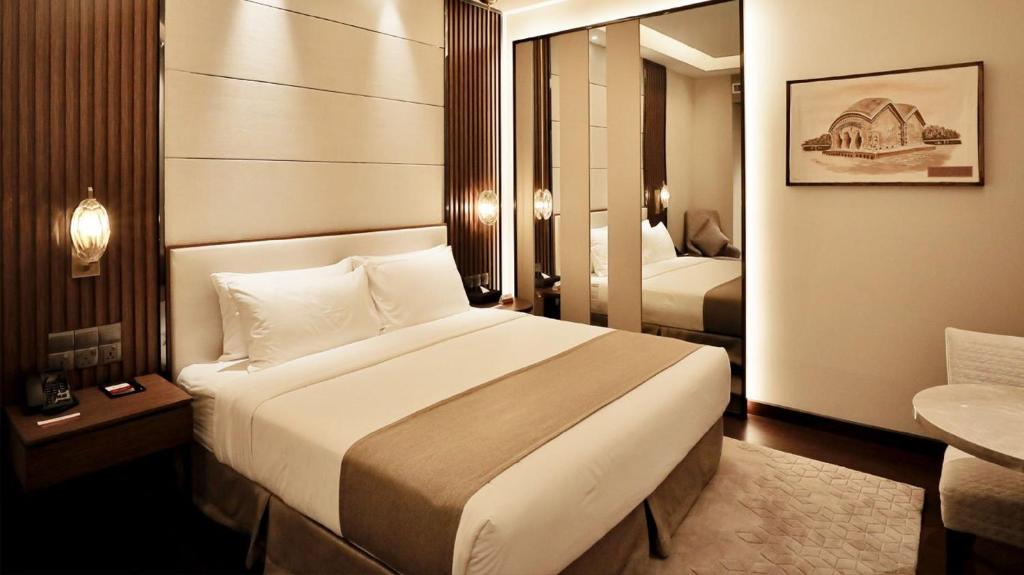Best Western PLUS Maya - Luxury Collection Hotel客房内的一张或多张床位