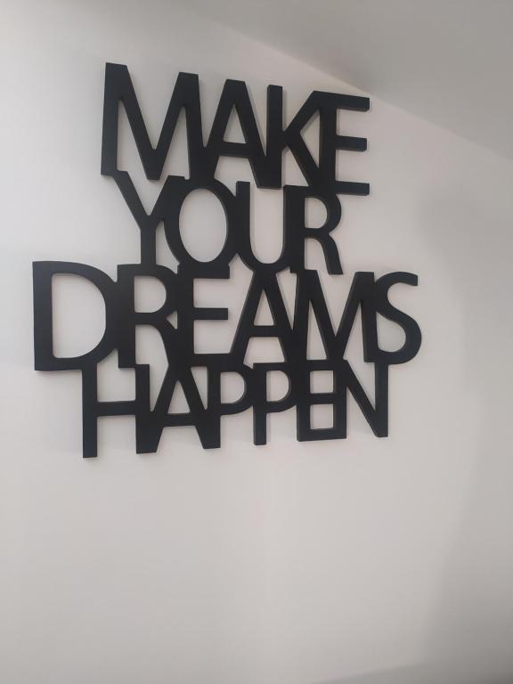 维罗纳Sweet Dream Loft的一种标志,它能让你的梦想在墙上实现