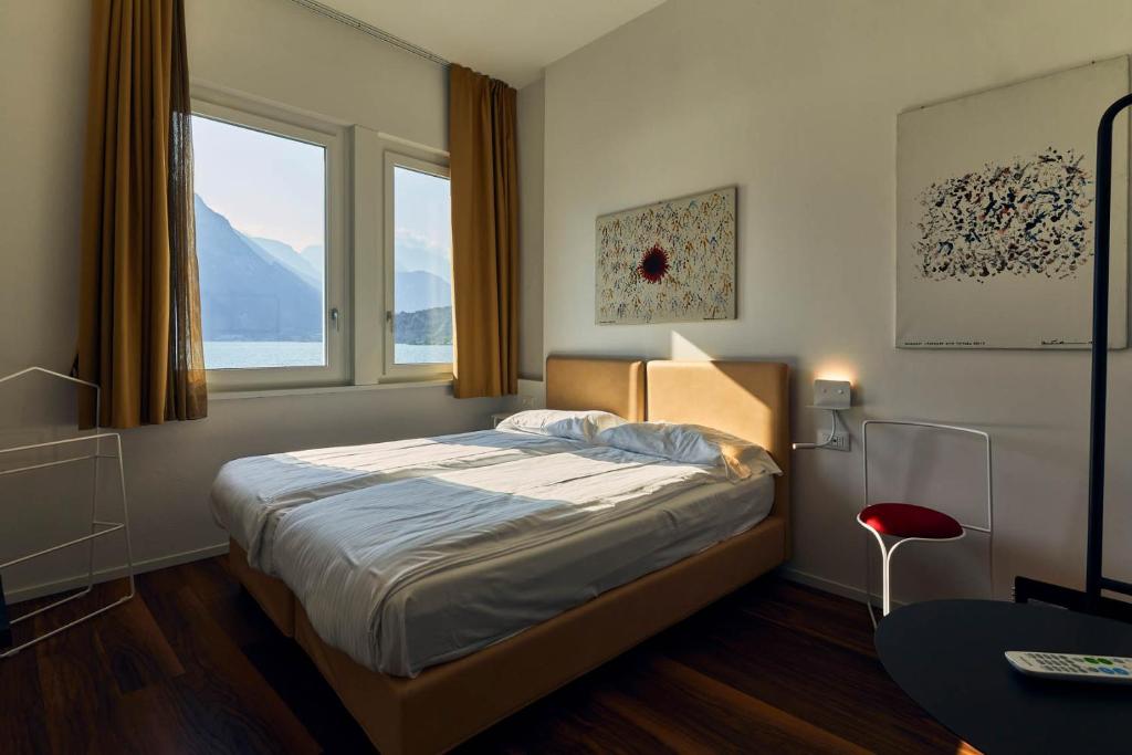 Hotel Paradiso Conca d'Oro客房内的一张或多张床位