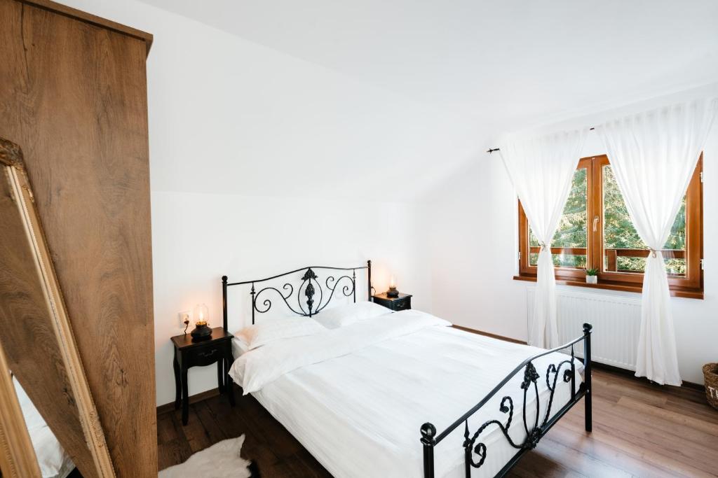 Casa Cifu Toplita客房内的一张或多张床位