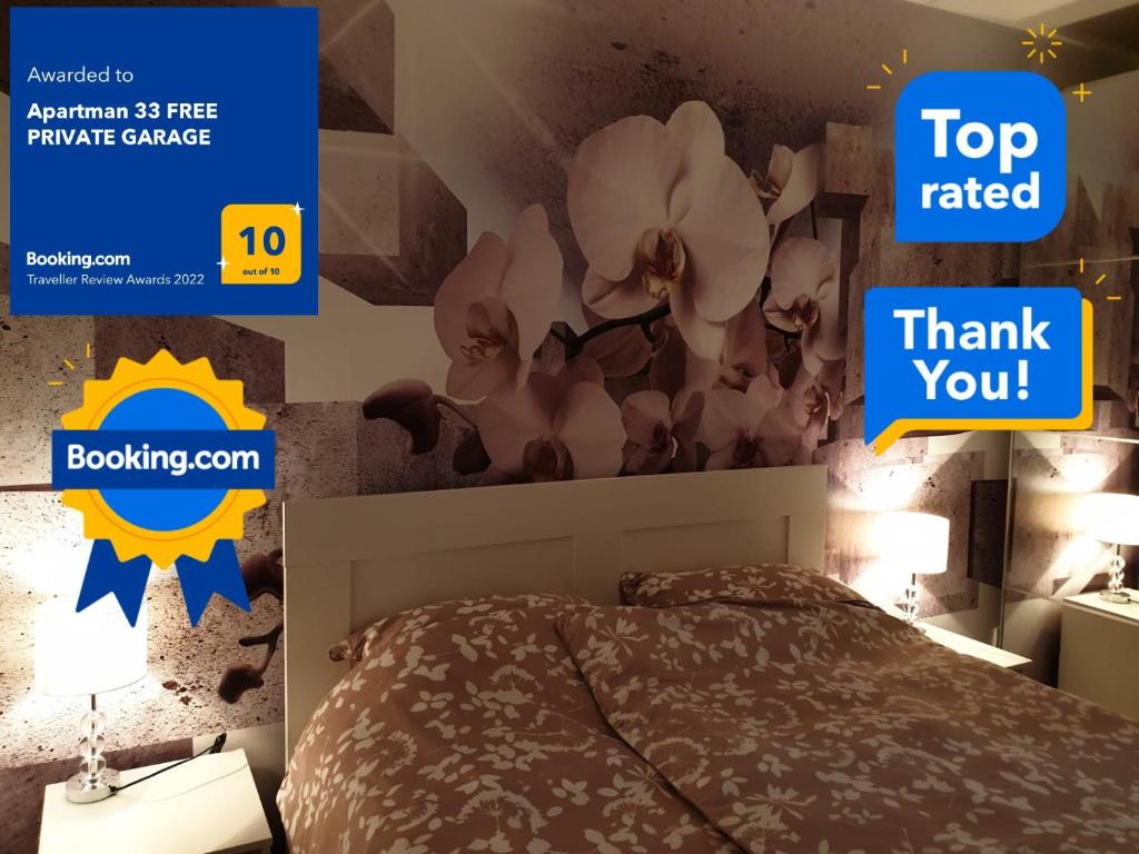 诺维萨德Apartman 33 FREE PRIVATE GARAGE的一间卧室,卧室里配有一张床和一个顶级的感谢标志