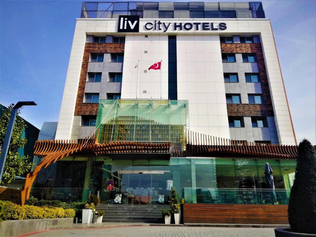 伊斯坦布尔Liv City Hotels的前面有标志的酒店