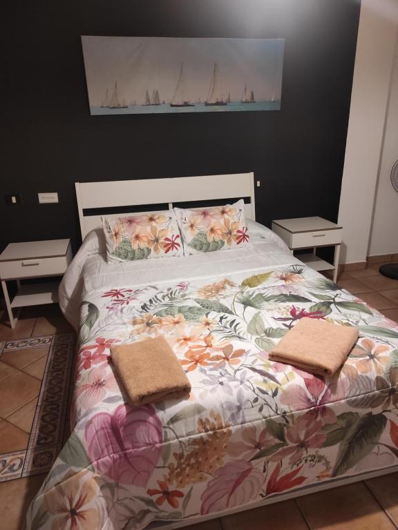ka Sánchez vecindario客房内的一张或多张床位