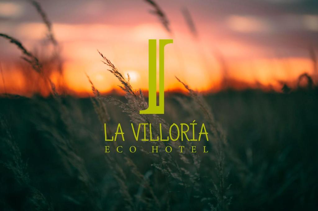 麦地那西多尼亚Hotel Restaurante La Villoría的草场酒店标志