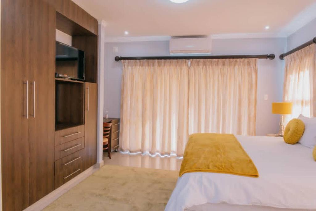 Mantenga Hillview客房内的一张或多张床位
