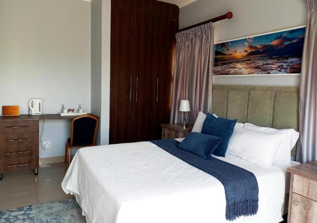 Mantenga Hillview客房内的一张或多张床位
