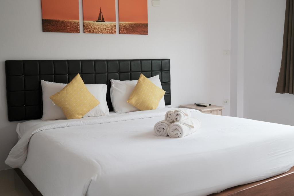 The Lodge at Koh Kood客房内的一张或多张床位