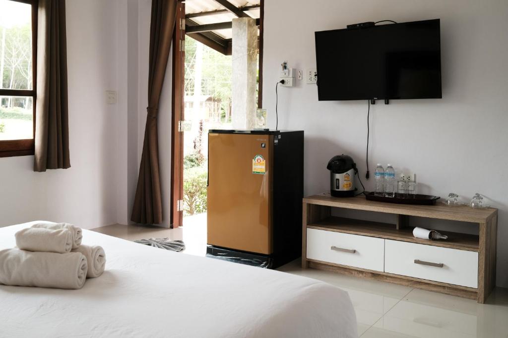 The Lodge at Koh Kood客房内的一张或多张床位
