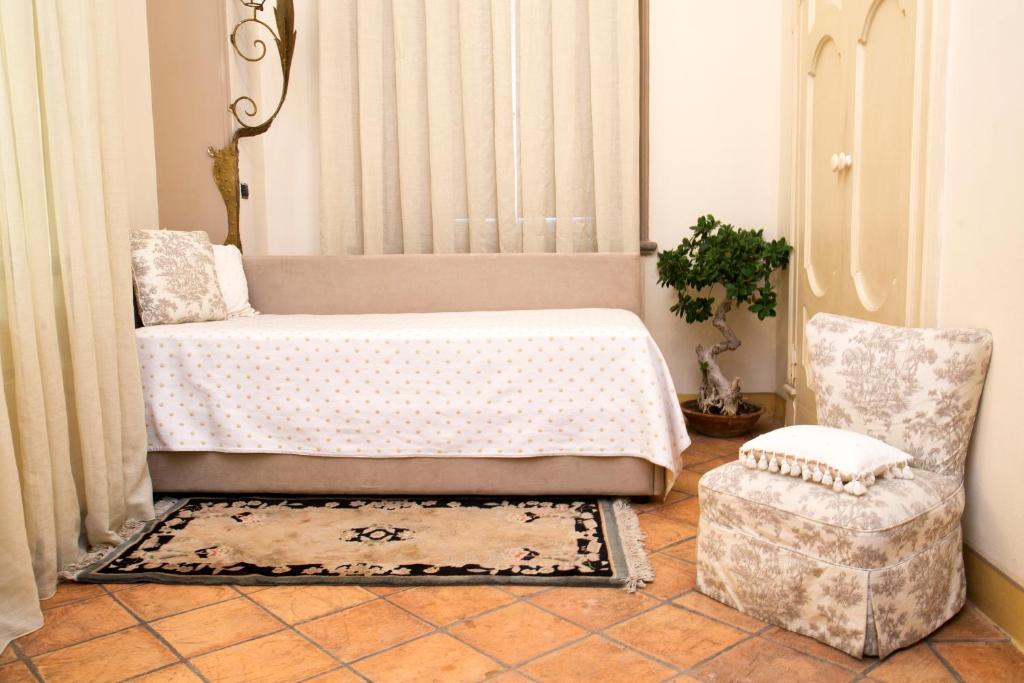 Casa Raiola Ercolano Luxury Rooms &amp; Spa客房内的一张或多张床位