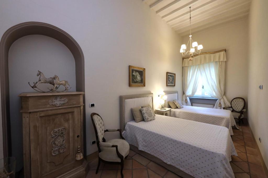 Casa Raiola Ercolano Luxury Rooms &amp; Spa客房内的一张或多张床位