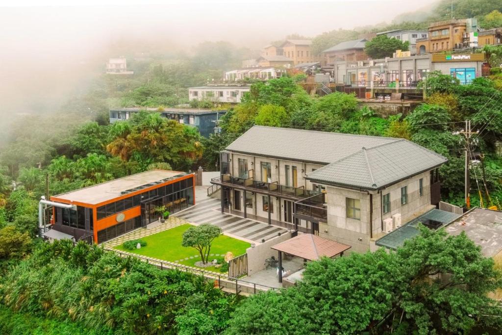 九份金漫會館-金瓜石九份景觀民宿-Jien Mount Villas的市中心的房子