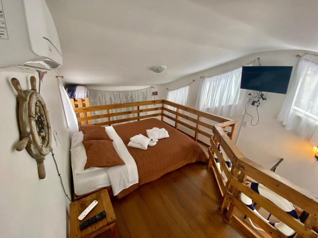 El Encanto del Manzano & Espacio Vittalia Spa客房内的一张或多张床位