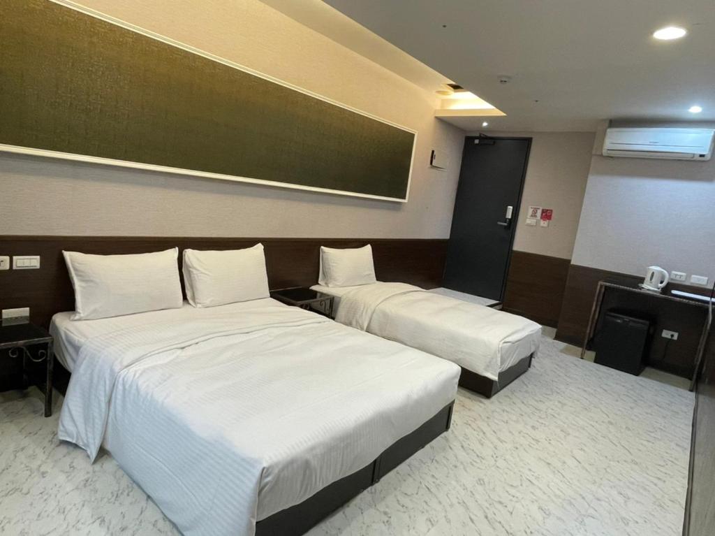 苓旅萬年-LIN INN Wan Nian客房内的一张或多张床位
