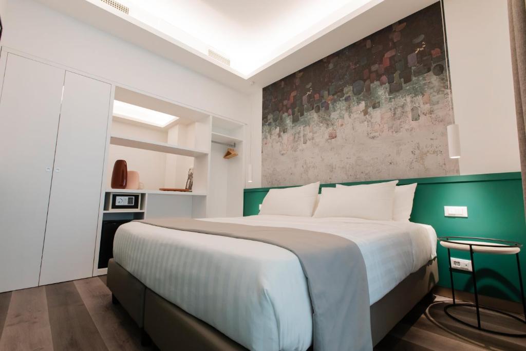 Smart Hotel Napoli客房内的一张或多张床位