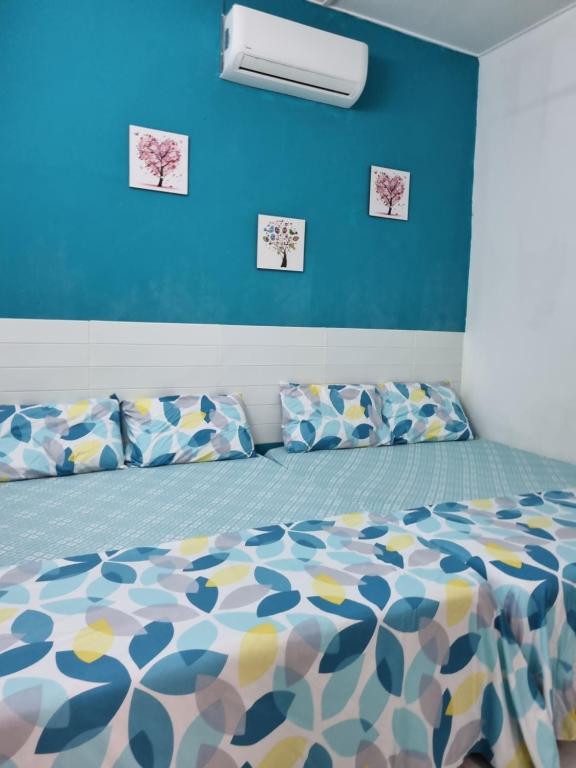 12-15 Pax Ssue Silibin Ipoh Guest House-Homestay客房内的一张或多张床位