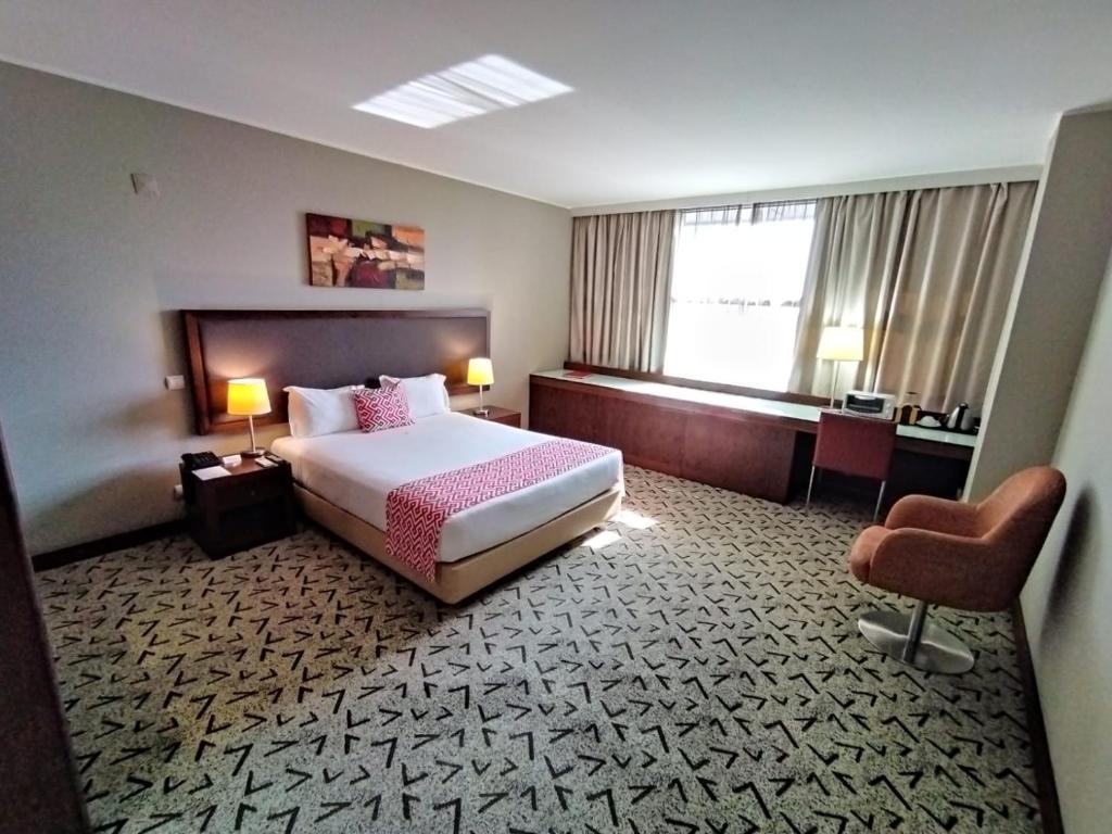卢安达斯凯纳酒店客房内的一张或多张床位
